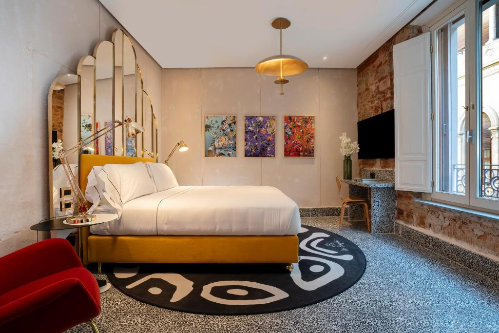 Hotel Calimala Florenceにあるベッド