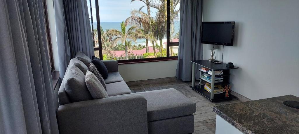 TV a/nebo společenská místnost v ubytování Ramsgate Ocean View