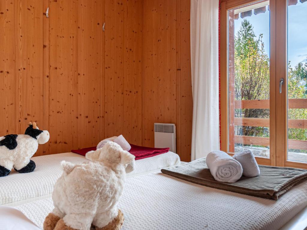 Postel nebo postele na pokoji v ubytování Chalet Sneachta by Interhome