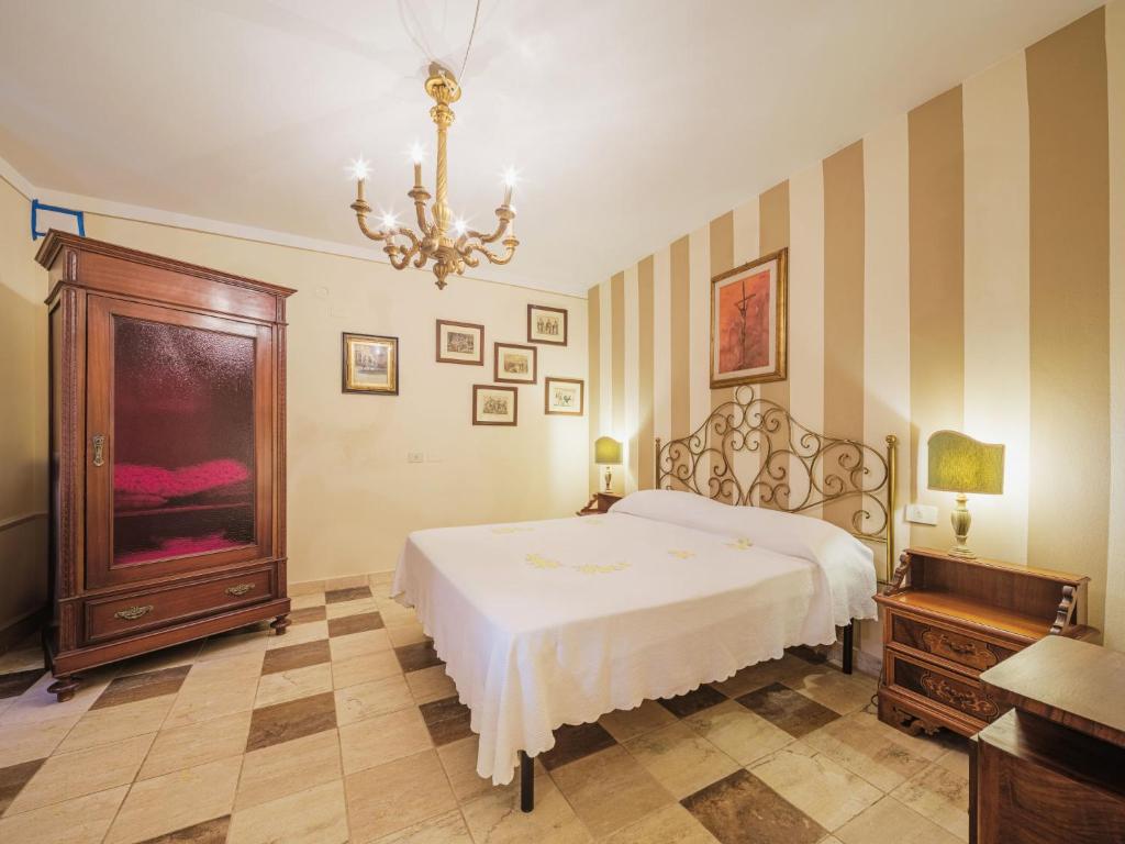 Postel nebo postele na pokoji v ubytování Holiday Home Oleandro by Interhome