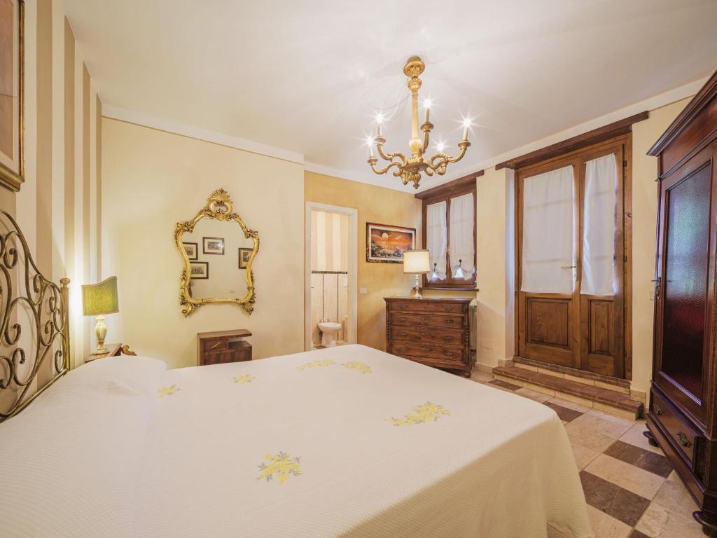 Postel nebo postele na pokoji v ubytování Holiday Home Oleandro by Interhome