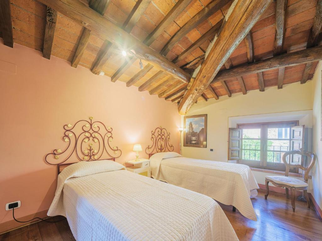 Postel nebo postele na pokoji v ubytování Holiday Home Oleandro by Interhome