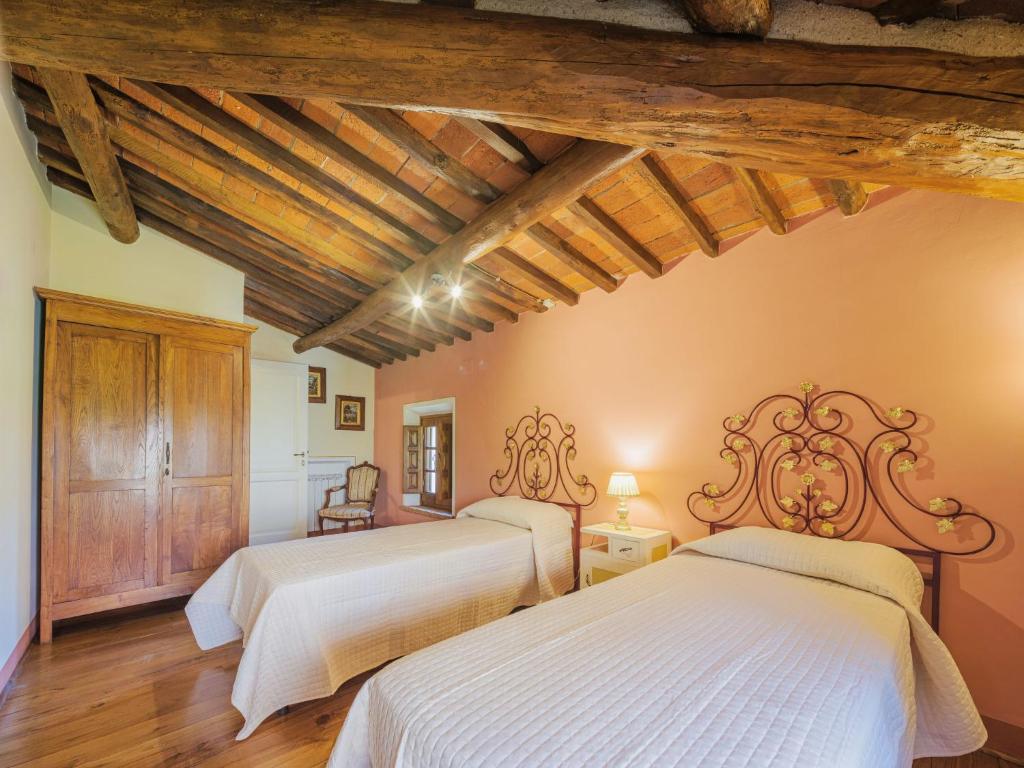 Postel nebo postele na pokoji v ubytování Holiday Home Oleandro by Interhome