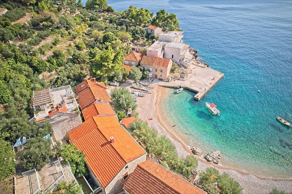 an aerial view of a house and the ocean at Apartments Villa Marija in Podobuče