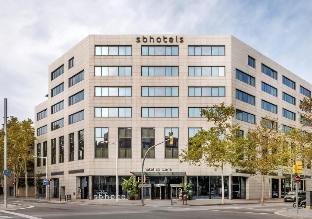 an office building with a sign on the front of it at Hotel SB Icaria in Barcelona