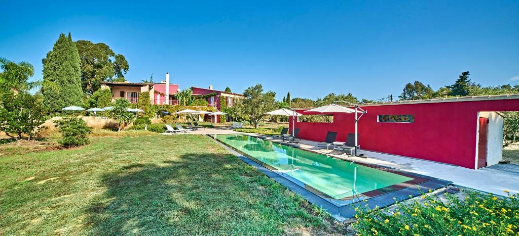 an image of a house with a swimming pool at VILLA MERCEDES 300 m de la plage in La Londe-les-Maures