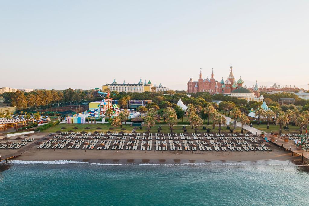 an aerial view of a large park with chairs and water at Kremlin Palace in Lara