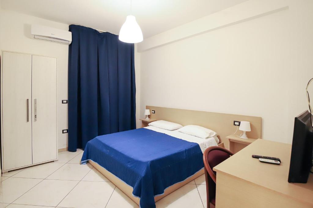 Postel nebo postele na pokoji v ubytování max hotel e restaurant