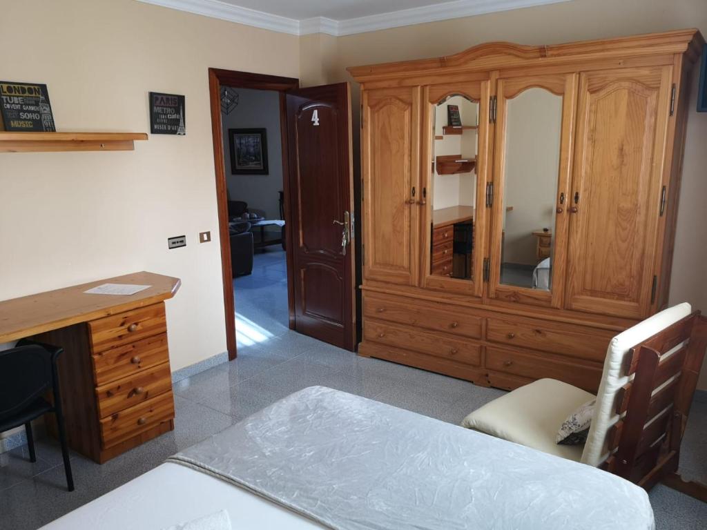 Postel nebo postele na pokoji v ubytování Vivienda el Timón
