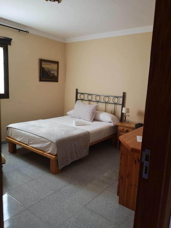 Postel nebo postele na pokoji v ubytování Vivienda el Timón