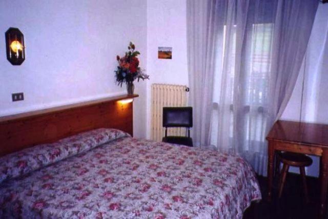 Postel nebo postele na pokoji v ubytování Hotel Savoia Debili