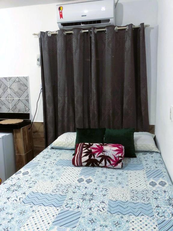 Postel nebo postele na pokoji v ubytování Suíte, Bem localizado em Morro de São Paulo Ba