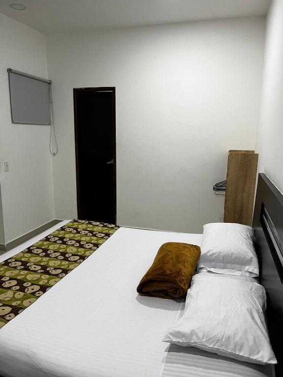 Postel nebo postele na pokoji v ubytování Hotel Laureles Park