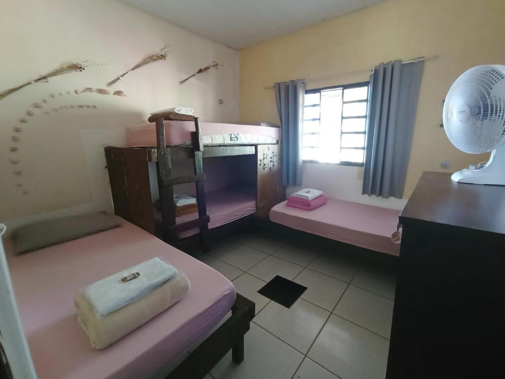 Postel nebo postele na pokoji v ubytování Hostel do Gui