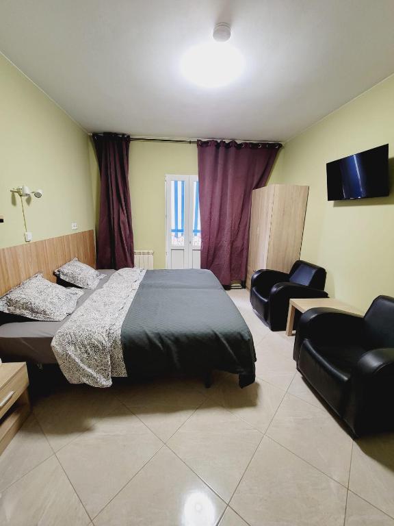 Posteľ alebo postele v izbe v ubytovaní Mini-hotel Casa de la Luz