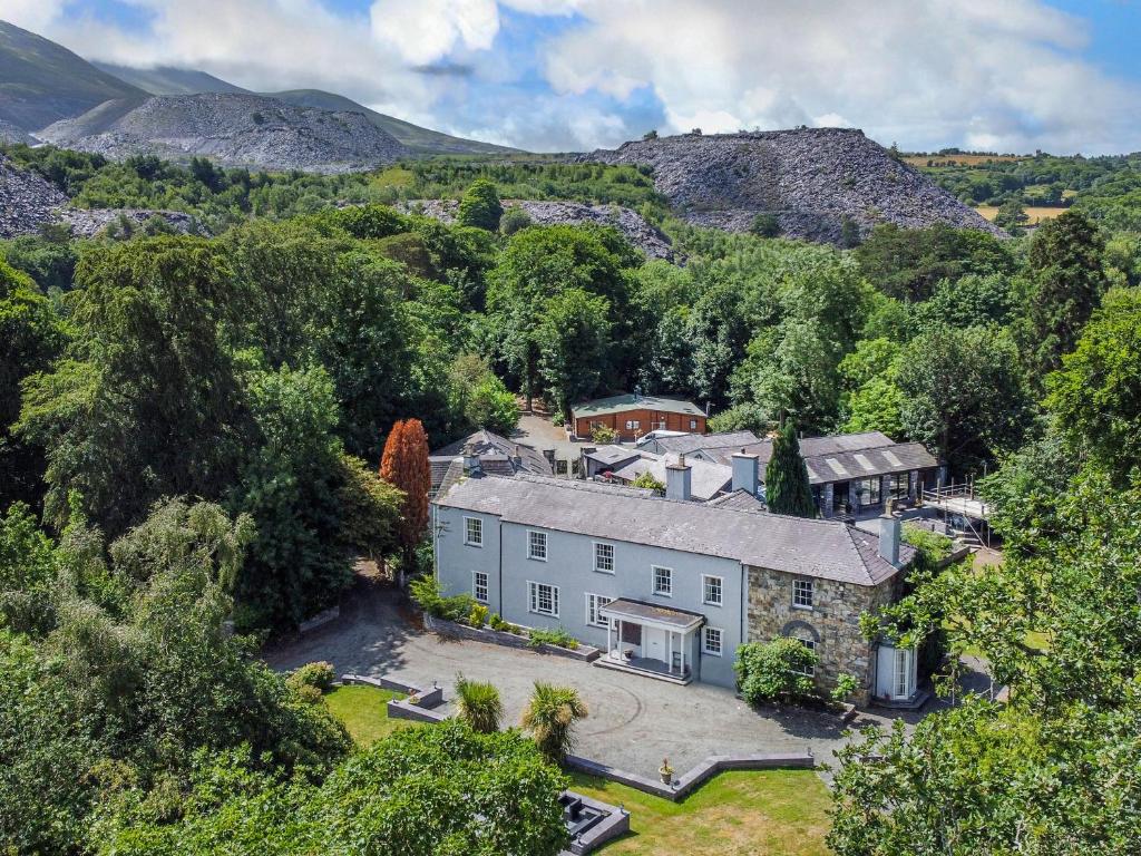an aerial view of a house in the mountains at Bryn Derwen in Bangor