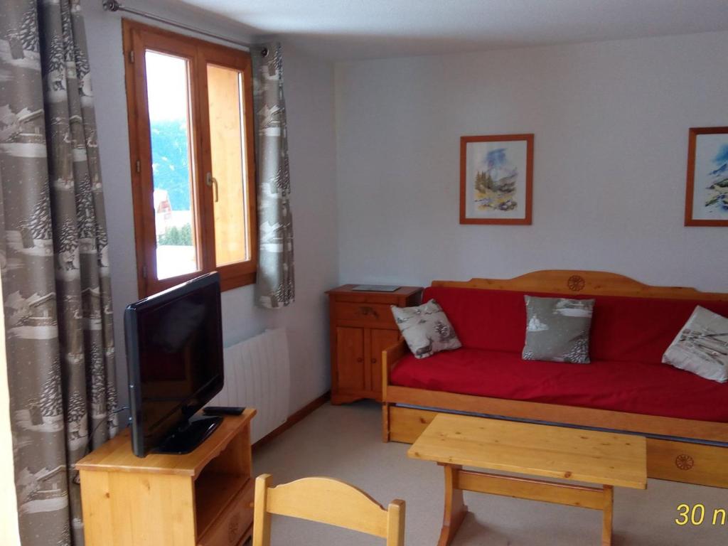 Appartement Valfréjus, 3 pièces, 6 personnes - FR-1-265-259にあるシーティングエリア