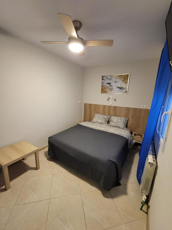 Posteľ alebo postele v izbe v ubytovaní Mini-hotel Casa de la Luz