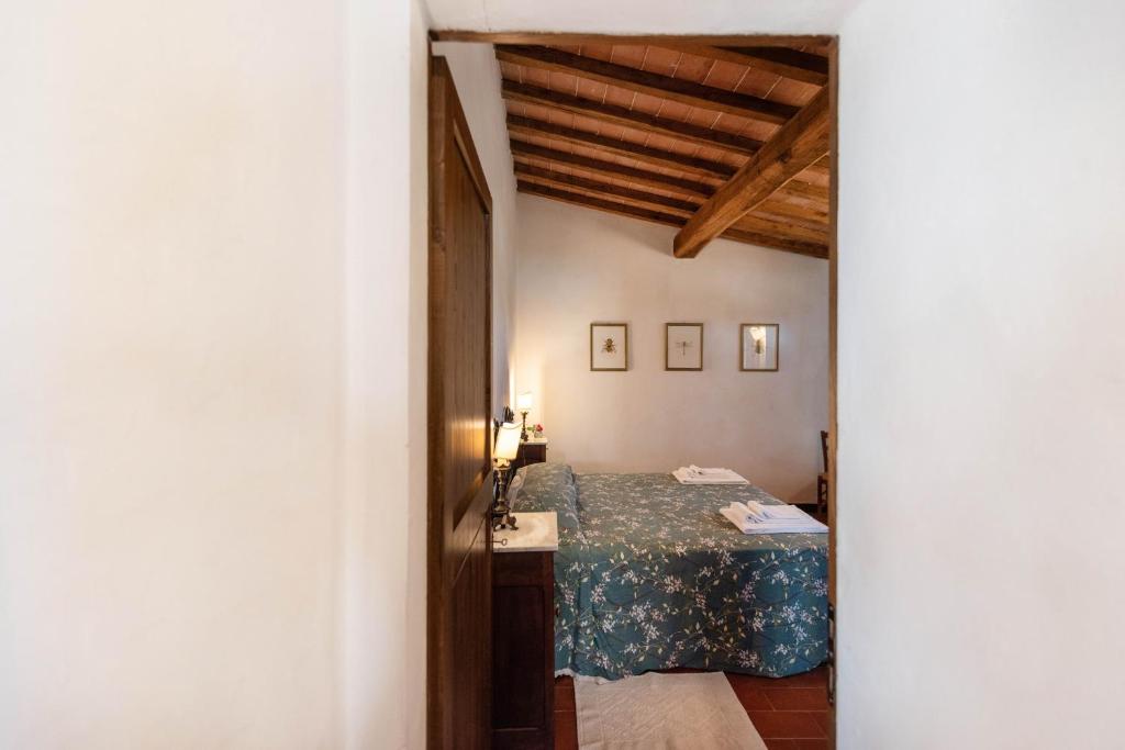 A bed or beds in a room at Colombina