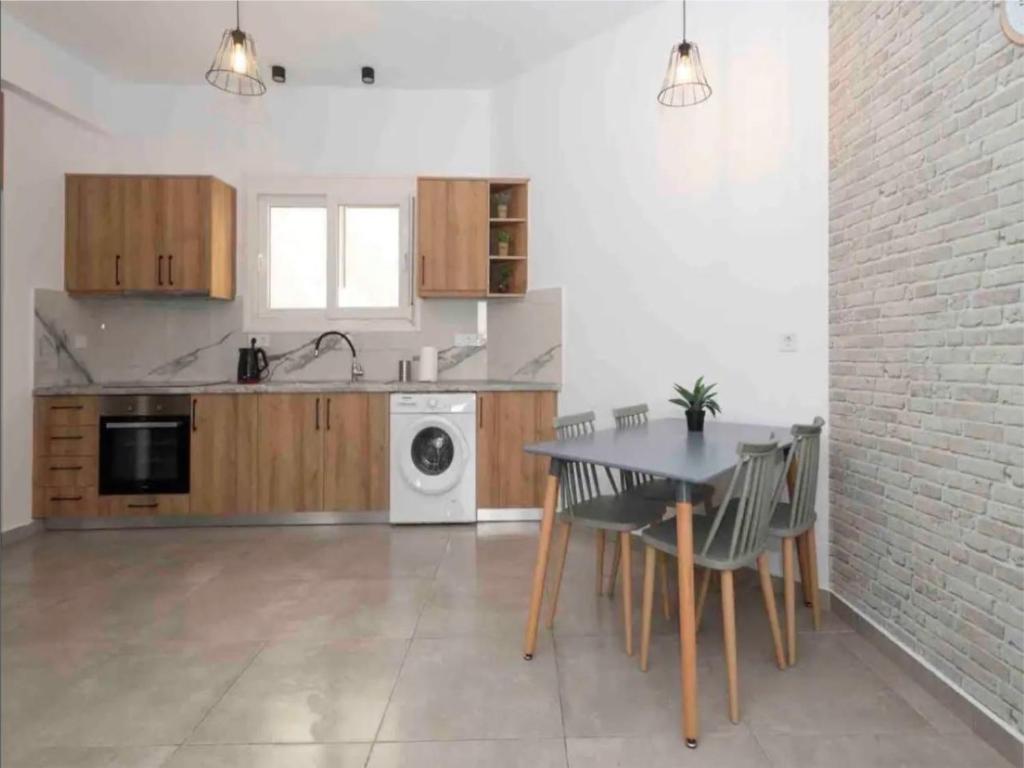 Kuchyň nebo kuchyňský kout v ubytování Mimikas Apartment
