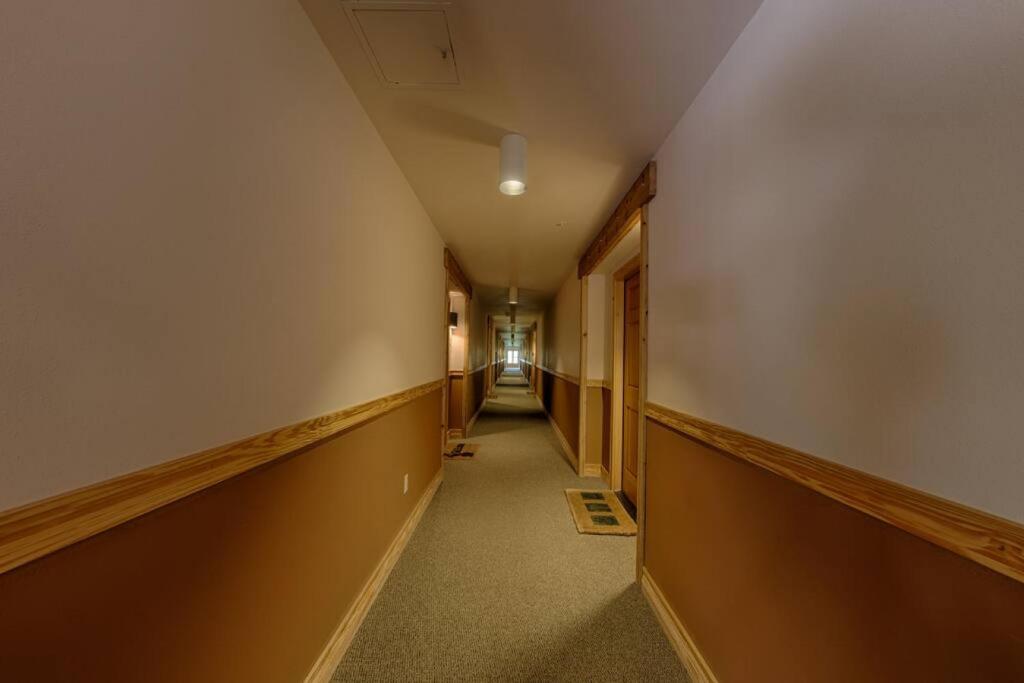 an empty hallway with a long corridor with a long hallway at Condo - Dreamcatcher 121 in Driggs