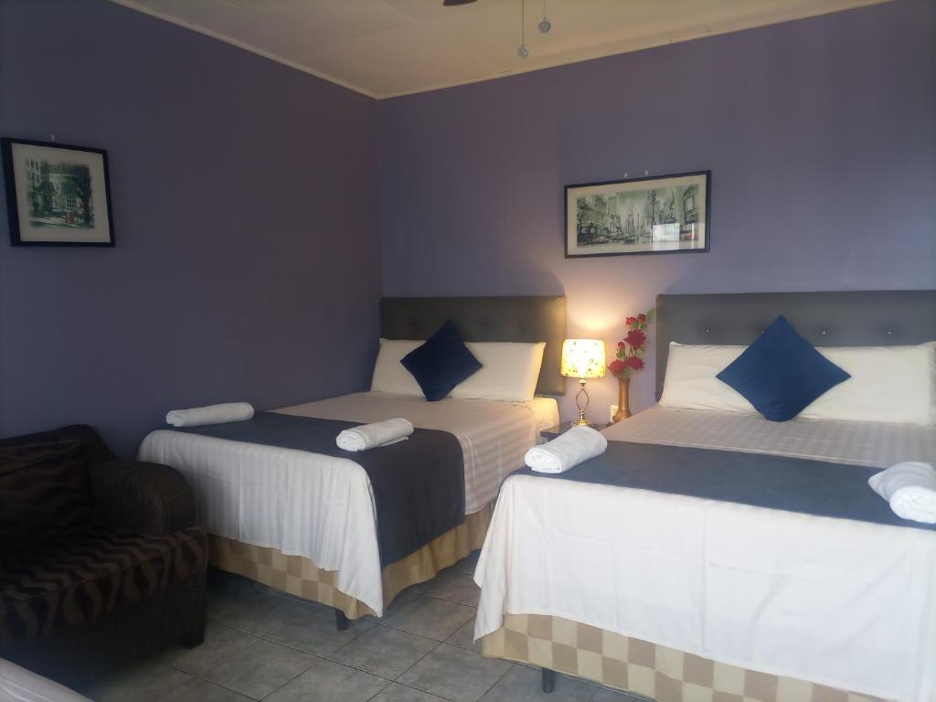 Postel nebo postele na pokoji v ubytování Hotel Vista del Mar