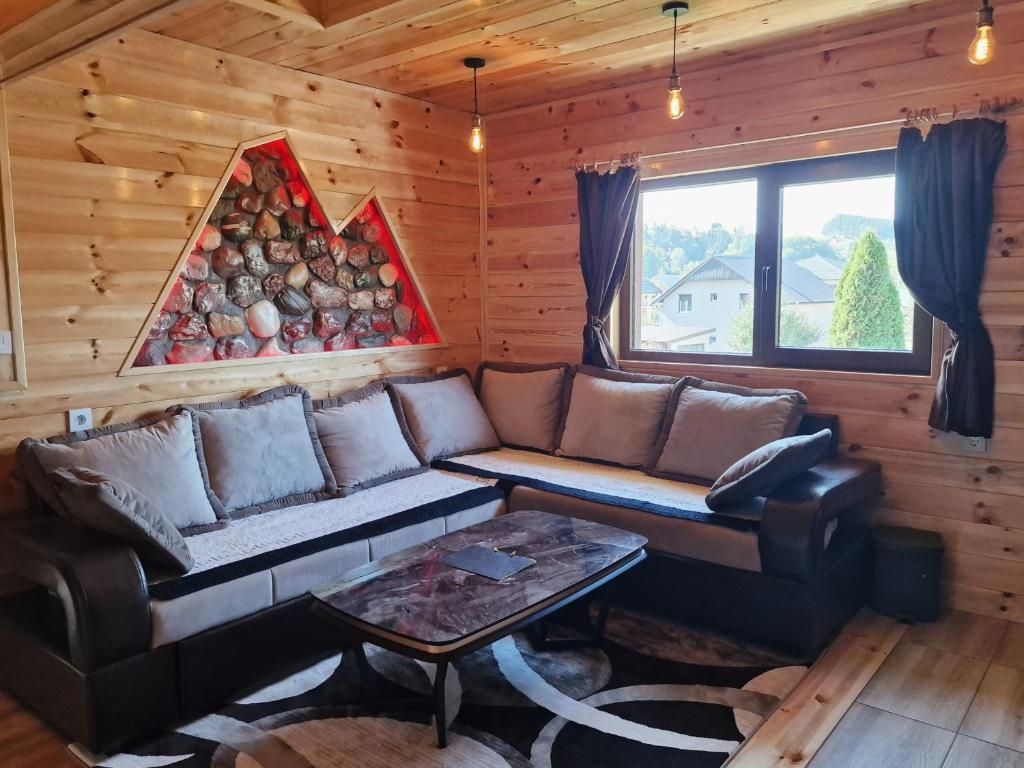 Posezení v ubytování Stone Lodge 3