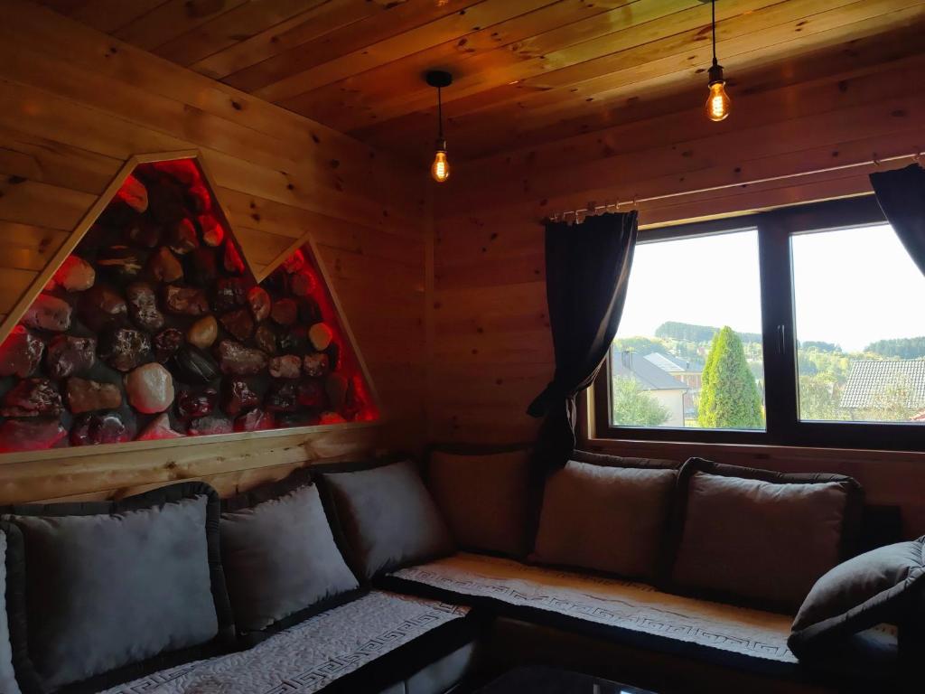 Posezení v ubytování Stone Lodge 3