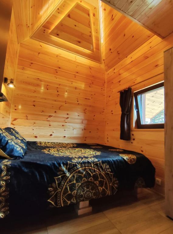 Postel nebo postele na pokoji v ubytování Stone Lodge 3