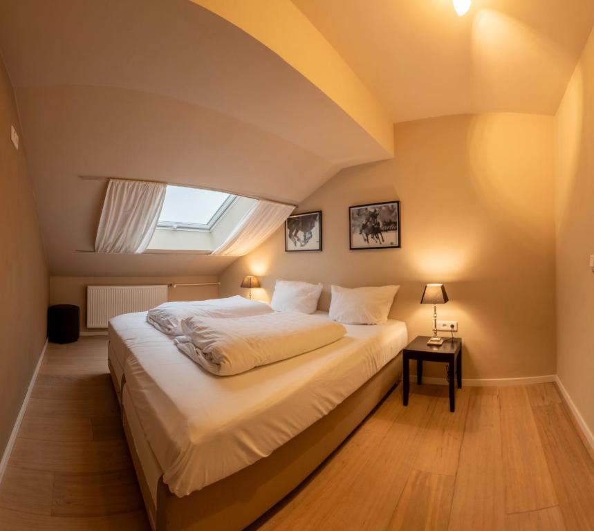 Postel nebo postele na pokoji v ubytování Landhotel Flora & Fauna