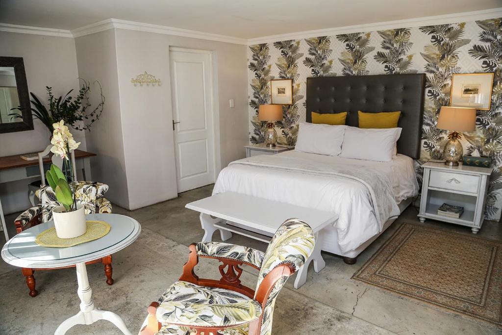Ένα ή περισσότερα κρεβάτια σε δωμάτιο στο 5 Konings Guesthouse