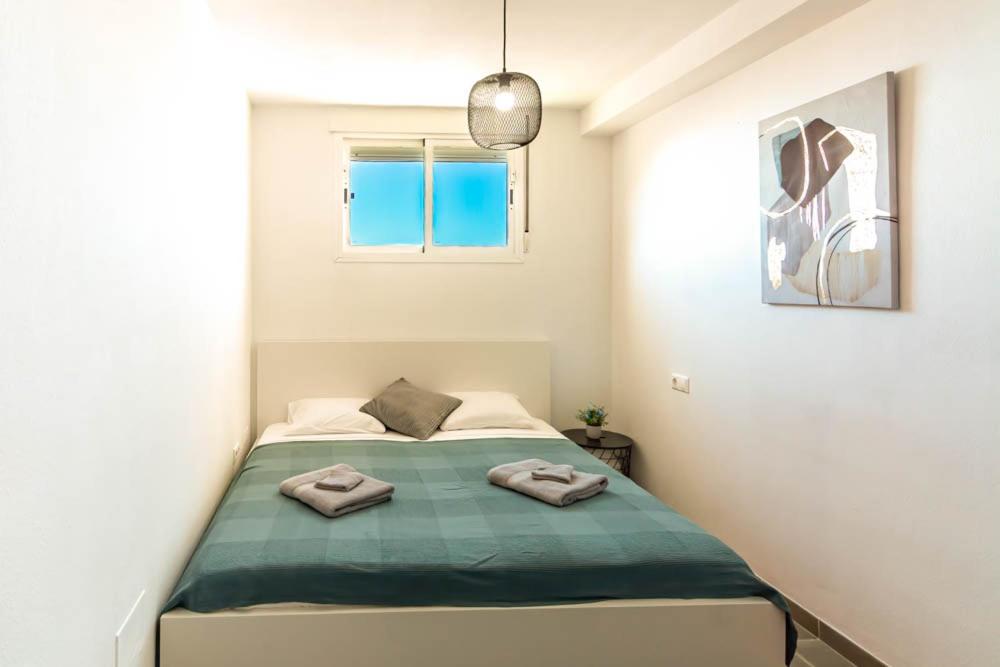 Postel nebo postele na pokoji v ubytování Torrox costa sea view