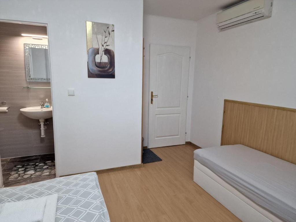 Postel nebo postele na pokoji v ubytování Penzion Lea