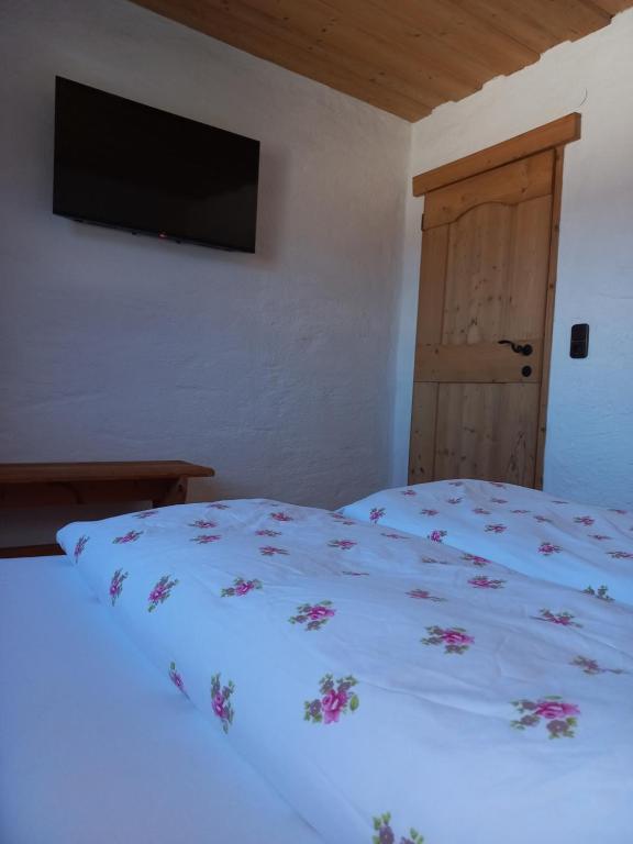 Postel nebo postele na pokoji v ubytování Scheffauerhof