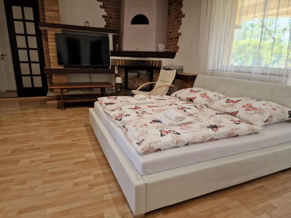 Postel nebo postele na pokoji v ubytování Penzion Lea