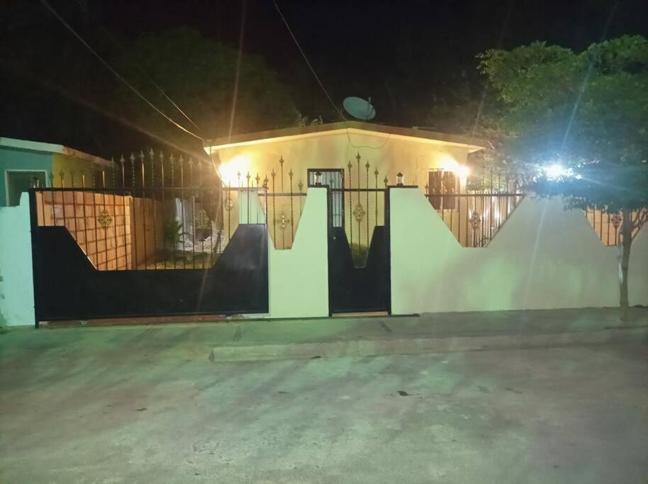 a skateboard ramp in front of a house at night at Alojamiento Familiar Pedernales. in Pedernales