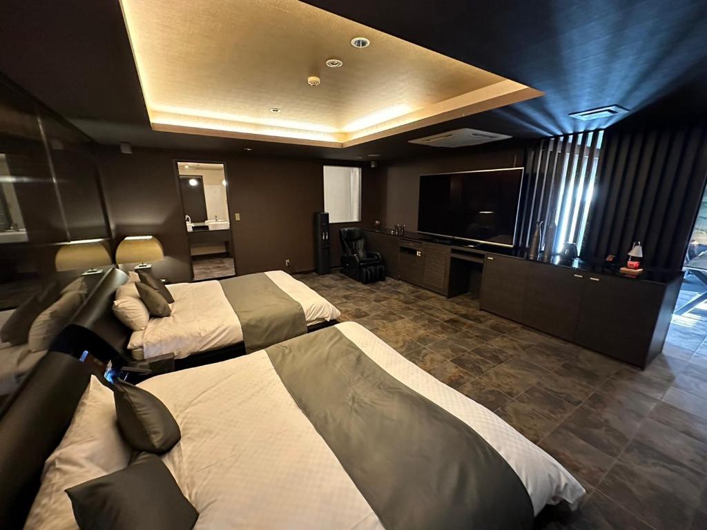 HOTEL felice Osaka -伊丹空港-にあるベッド