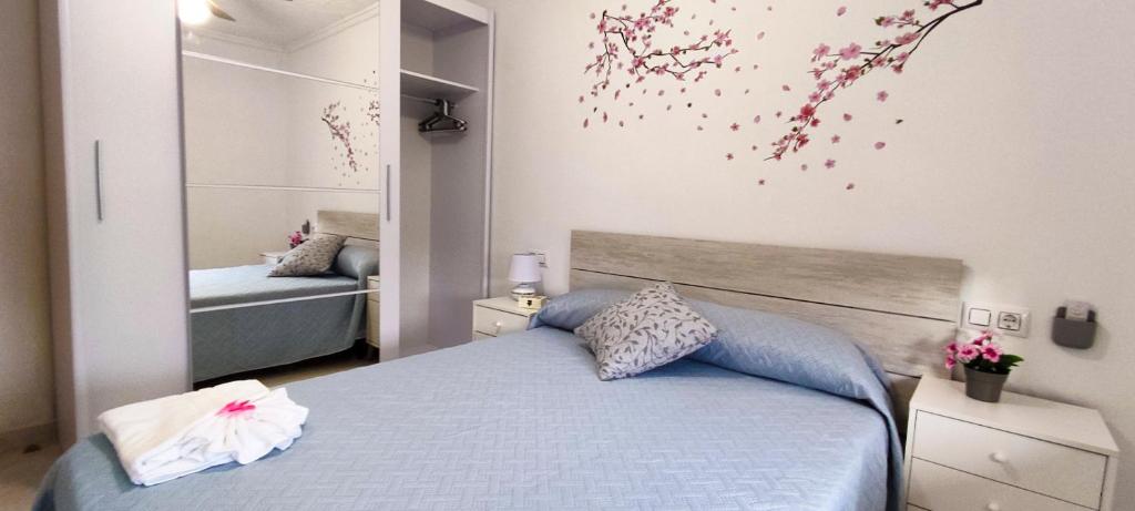 Postel nebo postele na pokoji v ubytování CASA SOLEADA Piscina CLIMATIZADA y PRIVADA