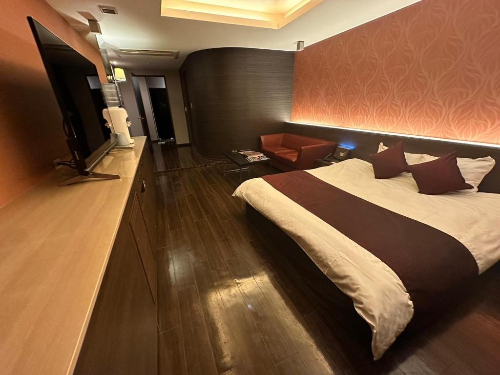 HOTEL felice Osaka -伊丹空港-にあるベッド