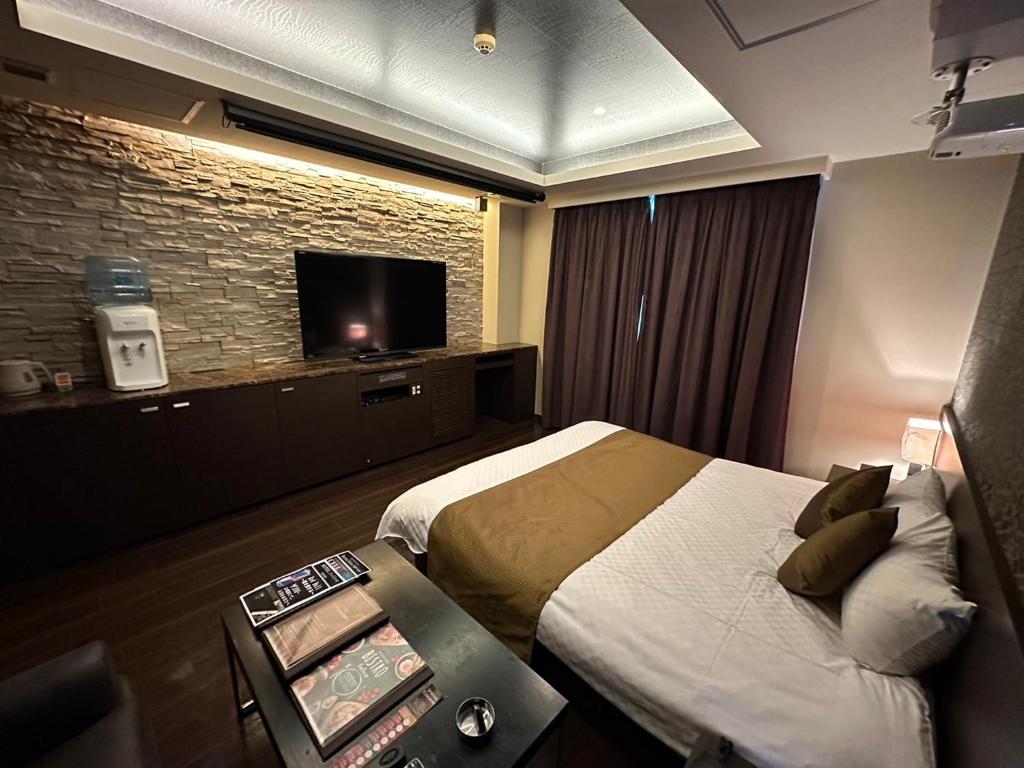 HOTEL felice Osaka -伊丹空港-にあるテレビまたはエンターテインメントセンター
