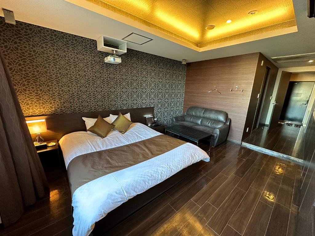 HOTEL felice Osaka -伊丹空港-にあるベッド