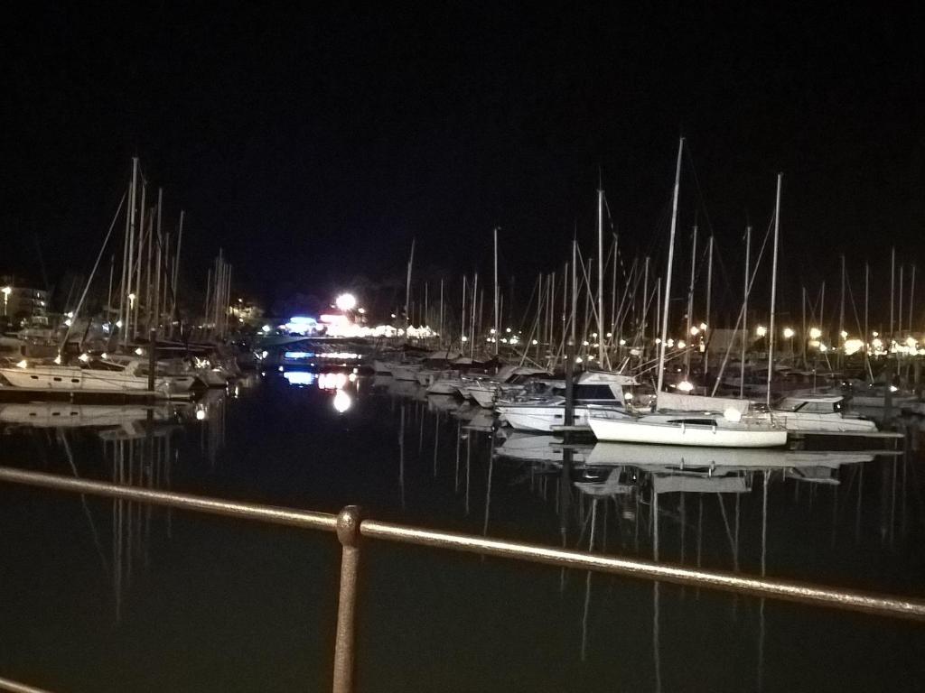 a group of boats docked in a marina at night at Appartement Capbreton, 2 pièces, 4 personnes - FR-1-239-872 in Capbreton