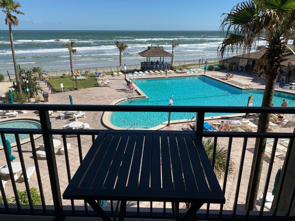 a view of the beach from the balcony of a resort at Oceanfront on Daytona Beach in Daytona Beach Shores