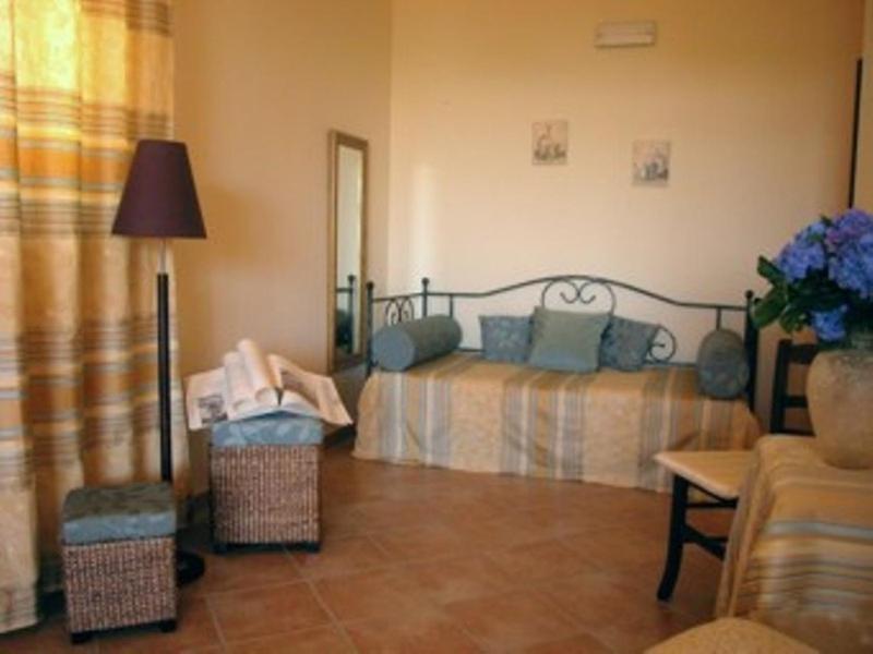 Postel nebo postele na pokoji v ubytování Residence Hotel La Commenda