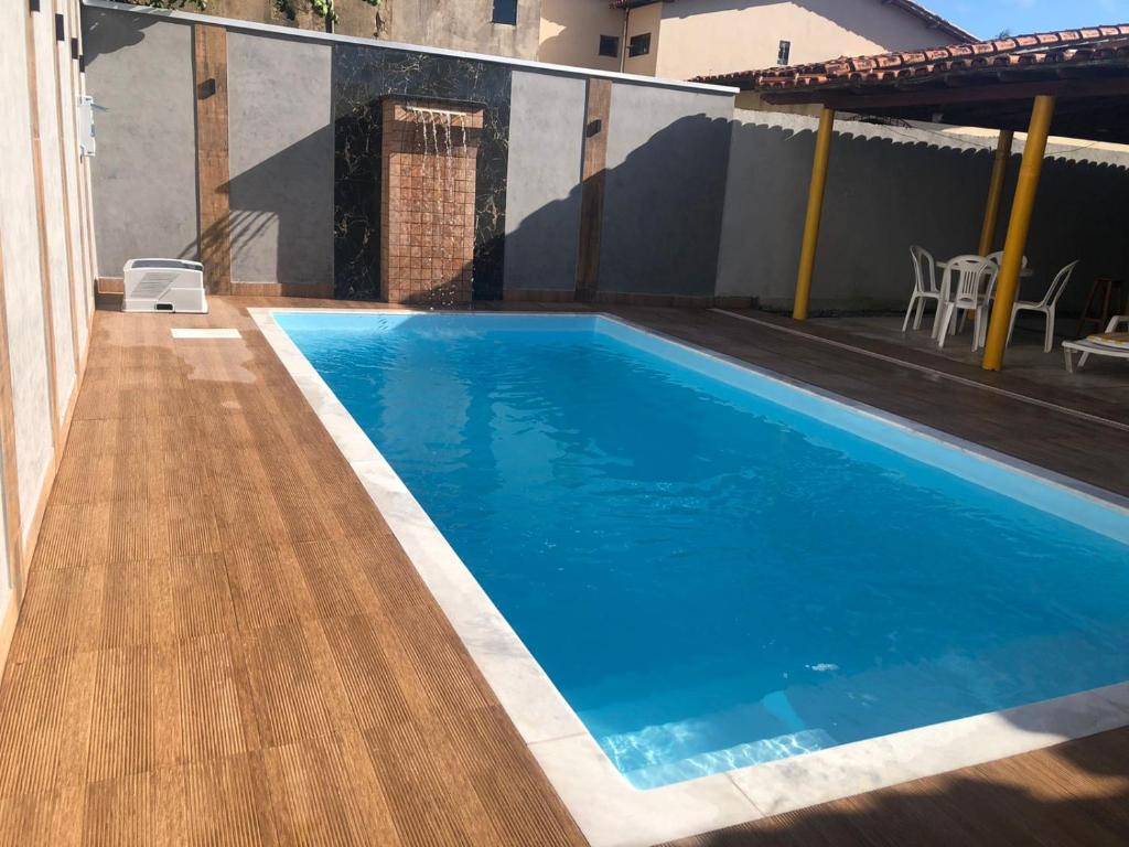 Swimmingpoolen hos eller tæt på Casa para temporada com Piscina