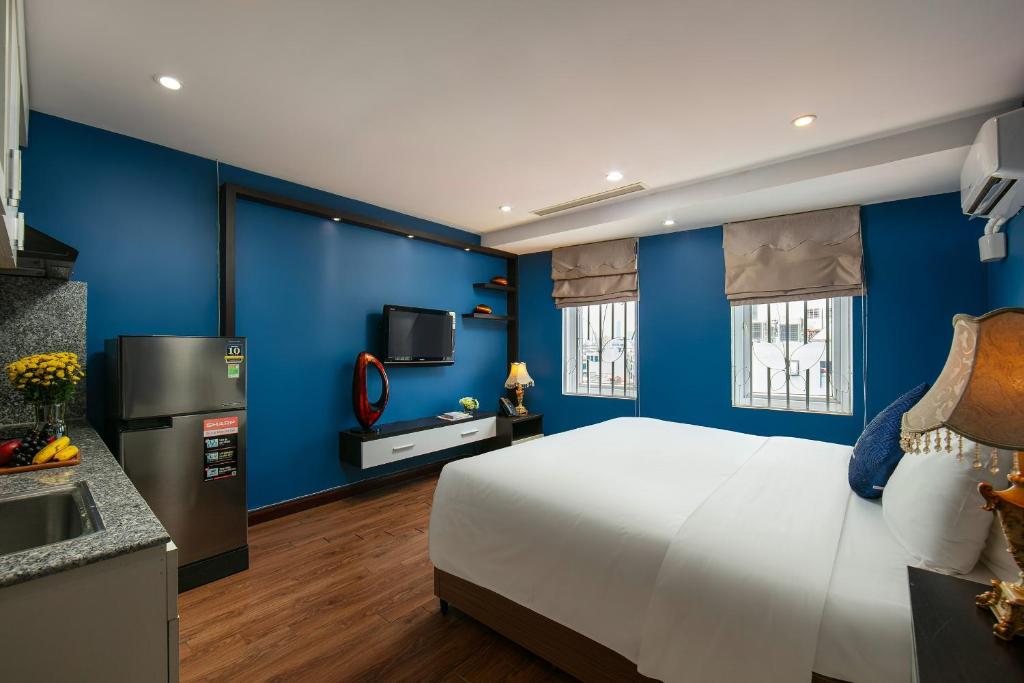 Postel nebo postele na pokoji v ubytování Hanoi 20 Hotel & Apartment