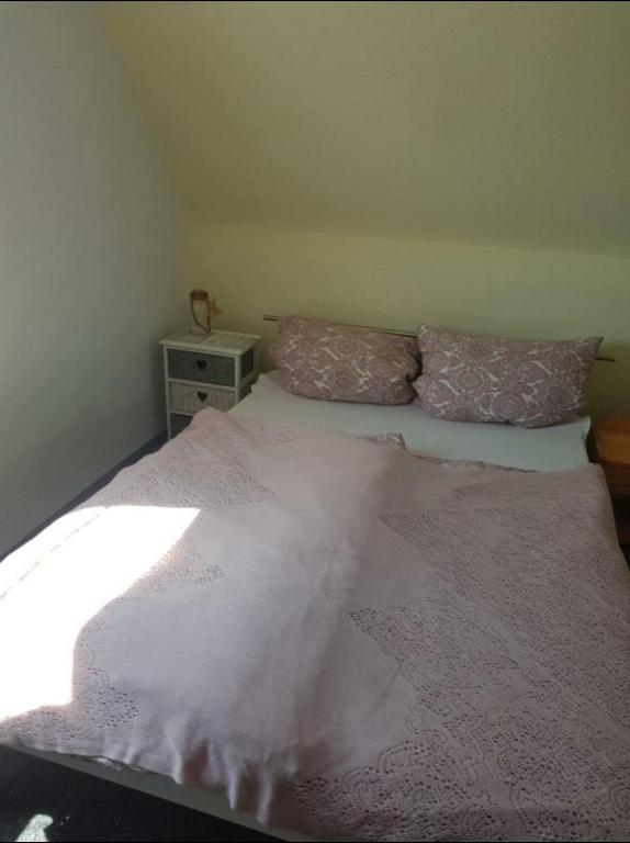 Postel nebo postele na pokoji v ubytování Ferienhaus auf Rügen