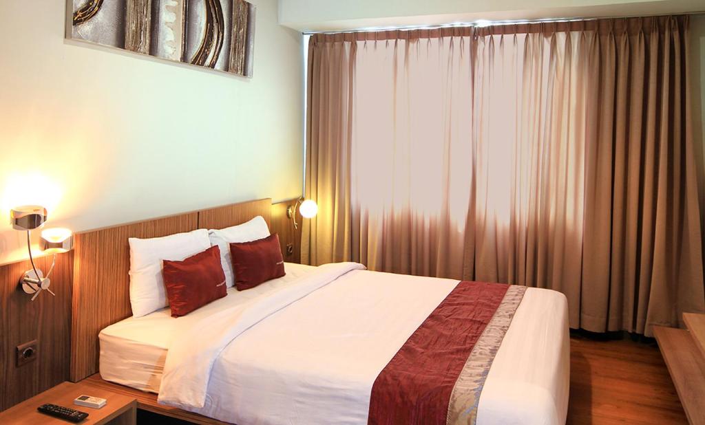Postel nebo postele na pokoji v ubytování Valore Hotel