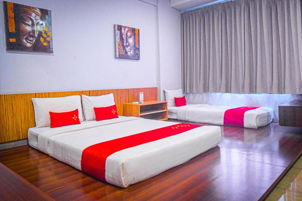 Postel nebo postele na pokoji v ubytování Valore Hotel