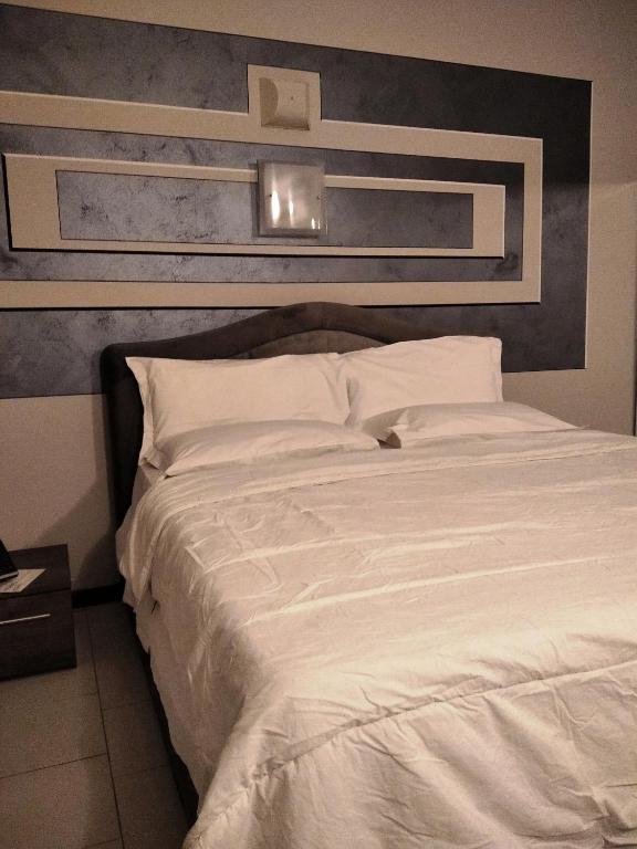 Postel nebo postele na pokoji v ubytování Hotel Motel Est